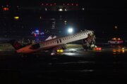 2 people killed in collision between jet and vehicle at New York's LaGuardia Airport, source says