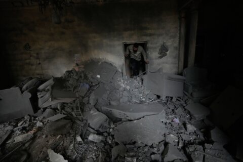 In a southern Lebanese city emptied by Israel’s offensive, some vow to stay put