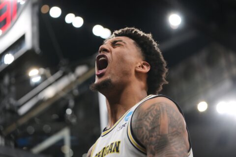 Yaxel Lendeborg scores 27 points as Michigan rolls into the Final Four, beating Tennessee 95-62