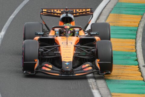 McLaren’s Oscar Piastri crashes out on the way to the grid for Formula 1’s Australian GP
