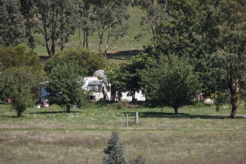 Australian police fatally shoot a suspect in a 3-hour standoff after 2 officers killed