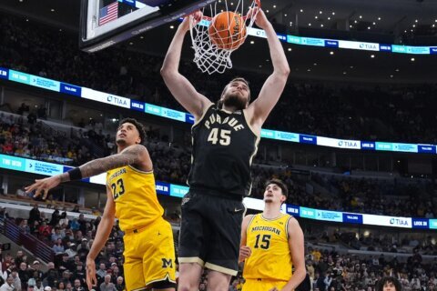 Cluff and Kaufman-Renn power No. 18 Purdue past No. 3 Michigan 80-72 in Big Ten final