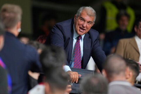 FC Barcelona’s 100,000-plus members vote for president with club buried under a mountain of debt