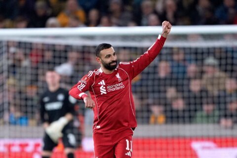 Robertson and Salah shine as Liverpool hits back to beat Wolves and reach FA Cup quarterfinals