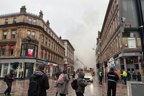 Glasgow building fire closes Scotland’s busiest train station and disrupts rail services