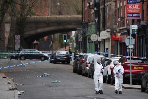 UK police arrest a man after a car hits pedestrians in the English city of Derby, injuring 7