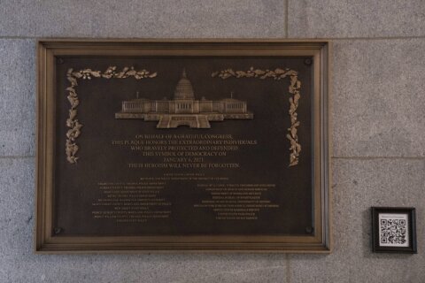 Jan. 6 plaque honoring police officers is installed at the Capitol after a 3-year delay