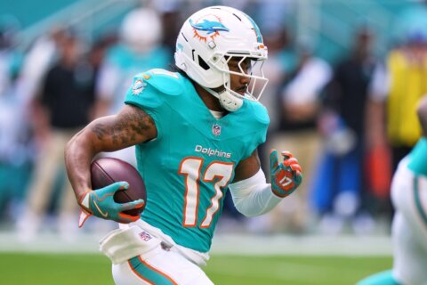 Broncos get star wide receiver Jaylen Waddle from Dolphins in a blockbuster trade, AP source says