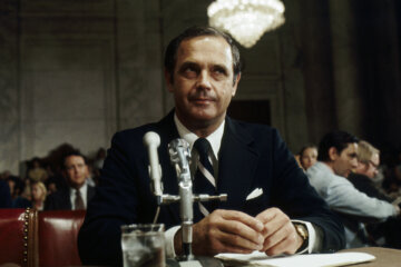 Alexander P. Butterfield, a former White House deputy assistant, testifies in front of the Senate Watergate Committee on July 16, 1973, in Washington, D.C. Butterfield, the White House aide who revealed that President Richard Nixon bugged the Oval Office and Cabinet Room and routinely recorded his conversations, has died. He was 99.