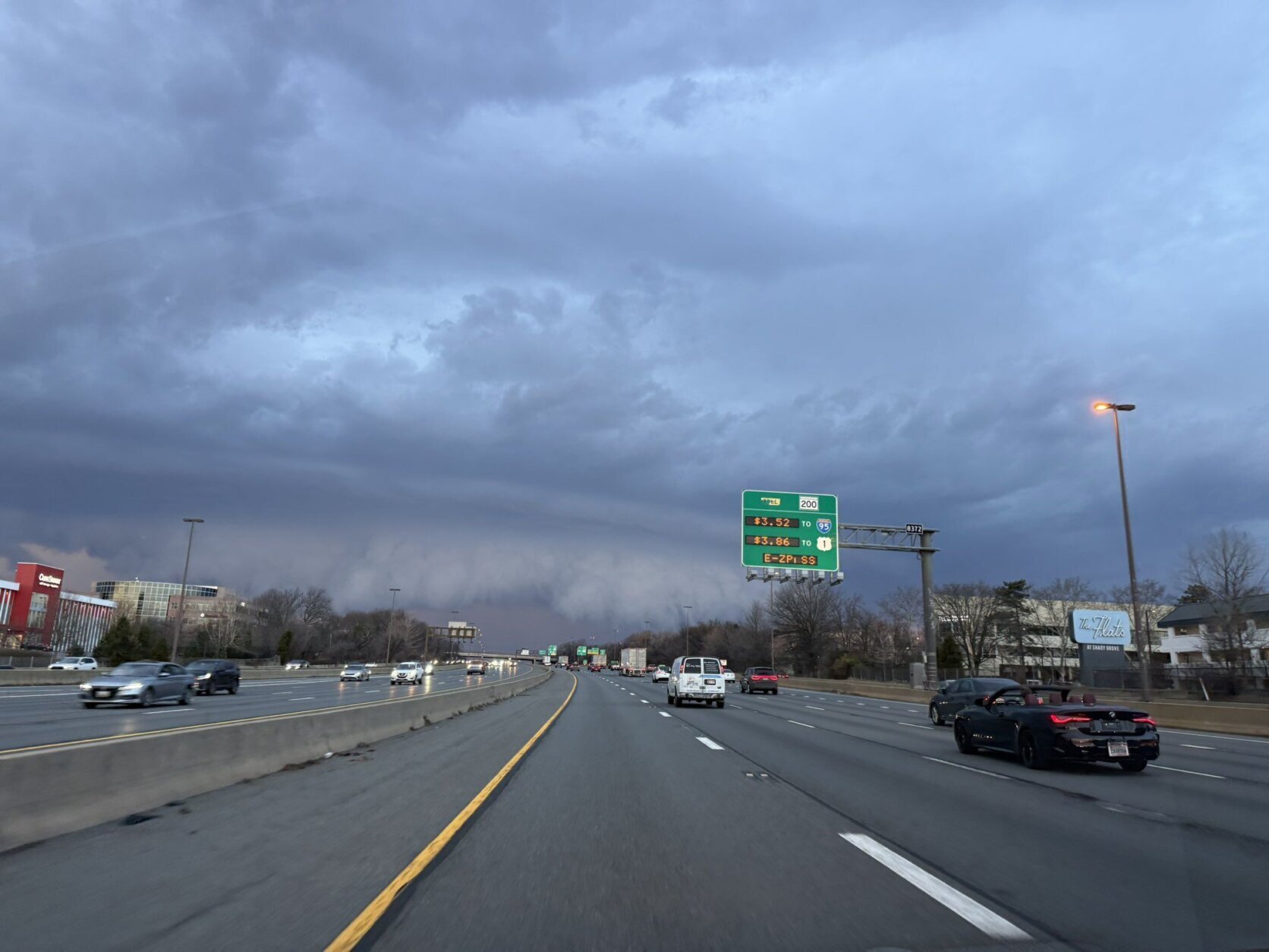 stormy clouds over road