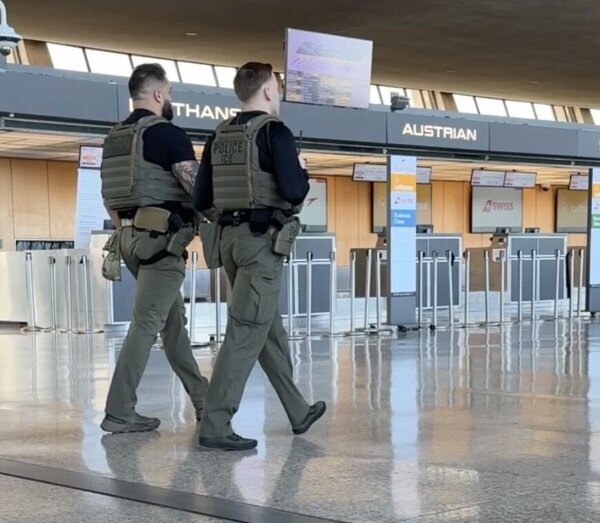 ICE officers patrol at Dulles Airport