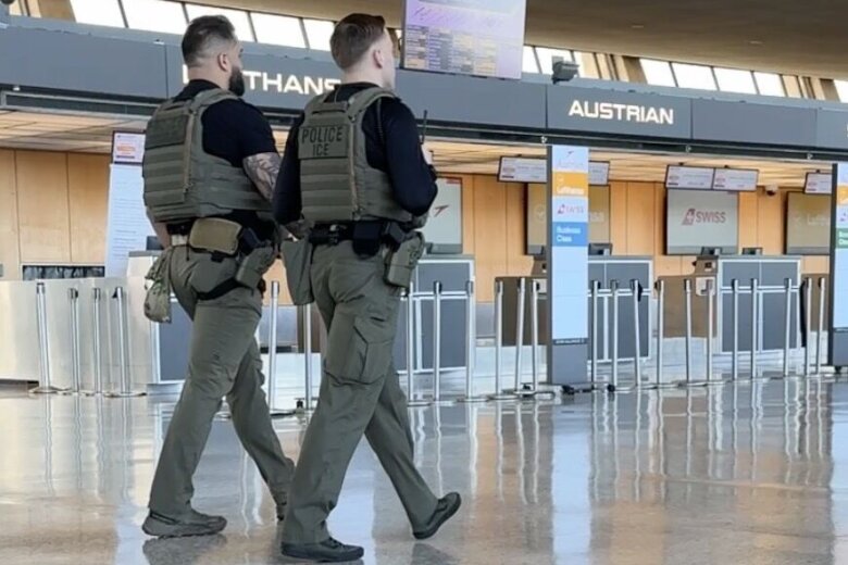 ICE officers patrol at Dulles Airport