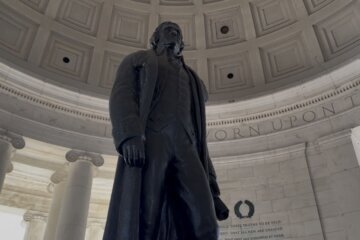 jefferson memorial statue pictured from below and inside