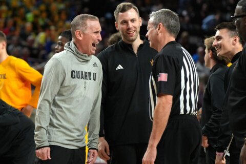 Arizona State beats No. 14 Kansas 70-60 in Hurley’s potential home finale