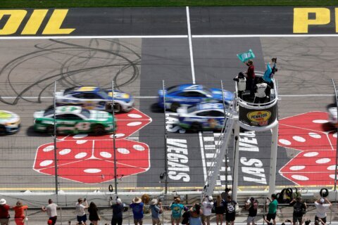 Denny Hamlin storms back to win at Las Vegas after early penalty