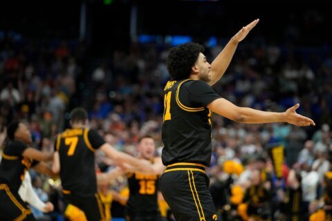 Iowa beats No. 1 seed and defending champ Florida in March Madness on Folgueiras’ 3 in final seconds