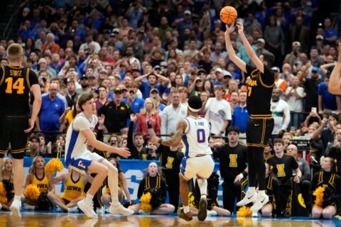 Iowa beats No. 1 seed and defending champ Florida in March Madness on Folgueiras’ 3 in final seconds