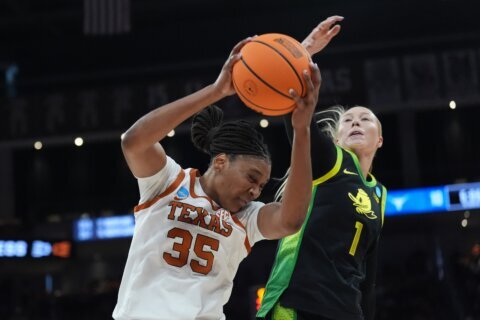 Booker’s March Madness moment is career high 40 as No. 1 Texas rolls over Oregon 100-58 to Sweet 16