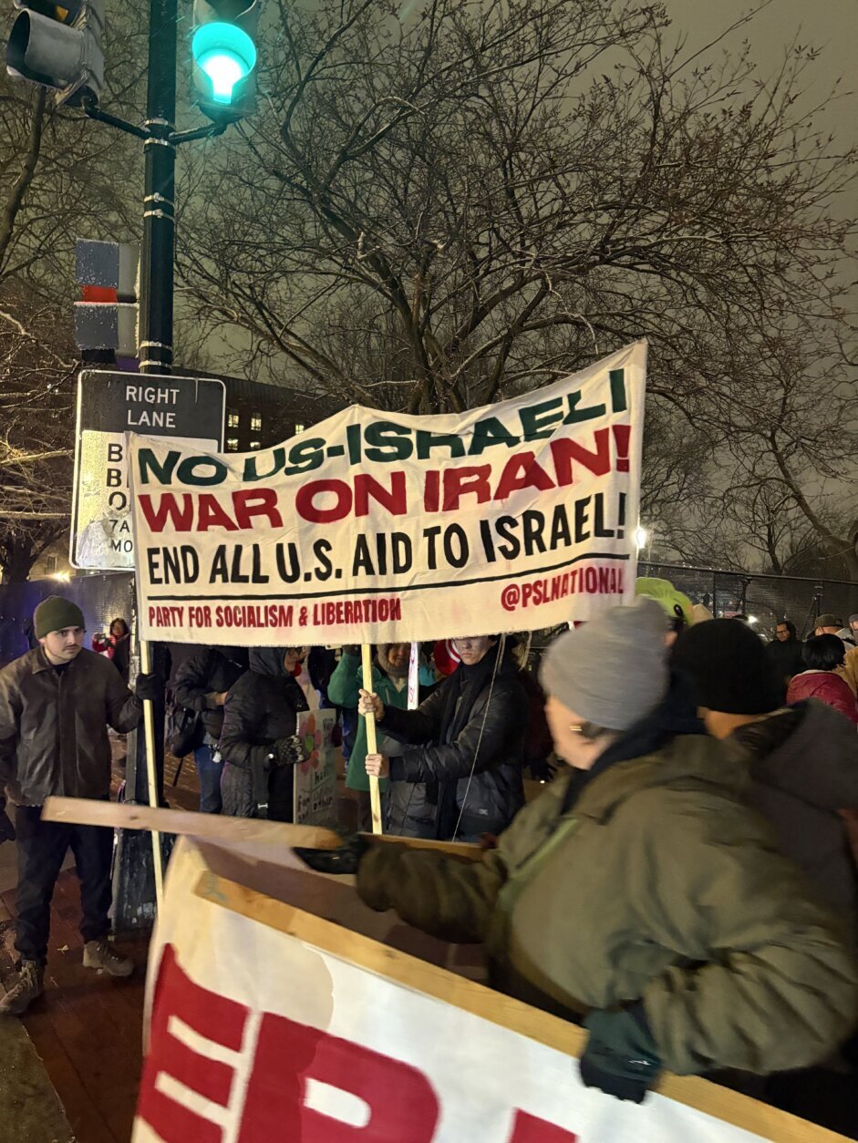 Protesters holding banner that reads 'No US-Israeli war on Iran! End all U.S. aid to Israel!' outside the White House, on Monday, March 2, 2026.