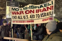 Protesters holding banner that reads 'No US-Israeli war on Iran! End all U.S. aid to Israel!' outside the White House, on Monday, March 2, 2026.