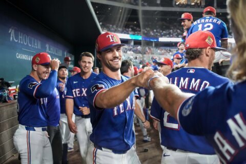 Rangers rookie pitcher finds out he made the team during a mound visit from manager