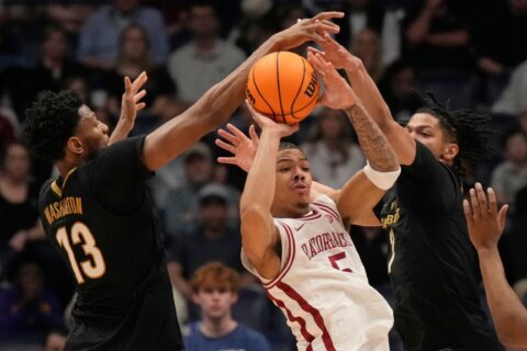 Arkansas tops Vanderbilt 86-75 to win SEC Tournament title