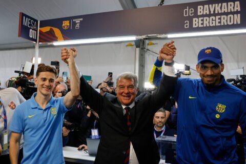Laporta wins 5 more years as president of Barcelona after thousands vote in club election