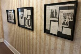 newspaper clippings hang inside of the hall