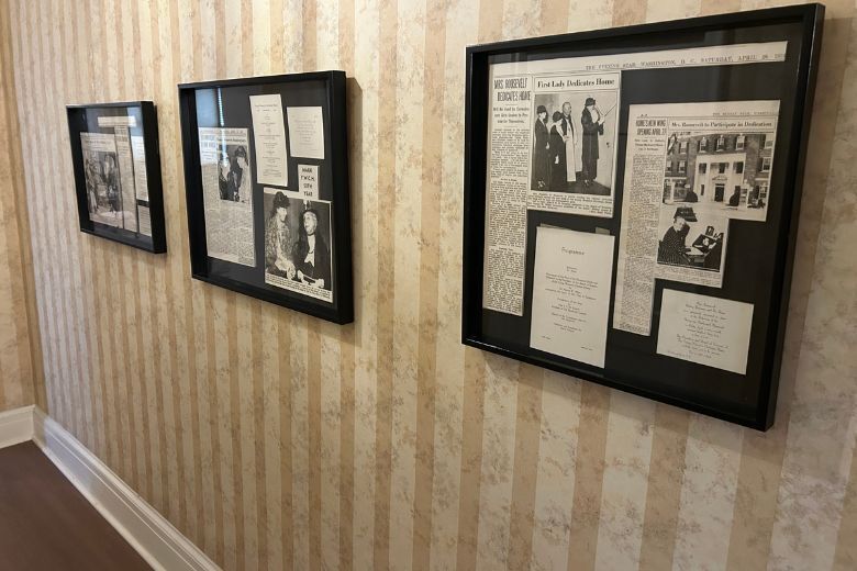 newspaper clippings hang inside of the hall