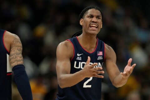 Hurley ejected in final second of Marquette’s 68-62 win over No. 4 UConn