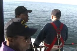 Crew on the bridge of the submarine.
