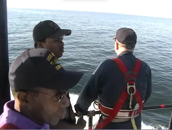 Crew on the bridge of the submarine.