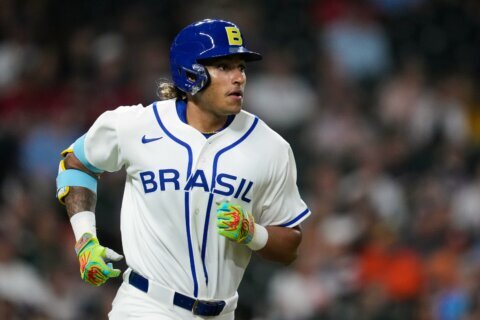 Like father, like son: Lucas Ramirez hits 2 homers for Brazil in WBC with dad Manny Ramirez watching