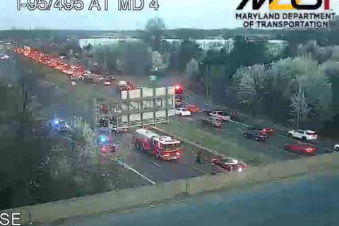 Burning vehicle causes backups on Outer Loop in Forestville