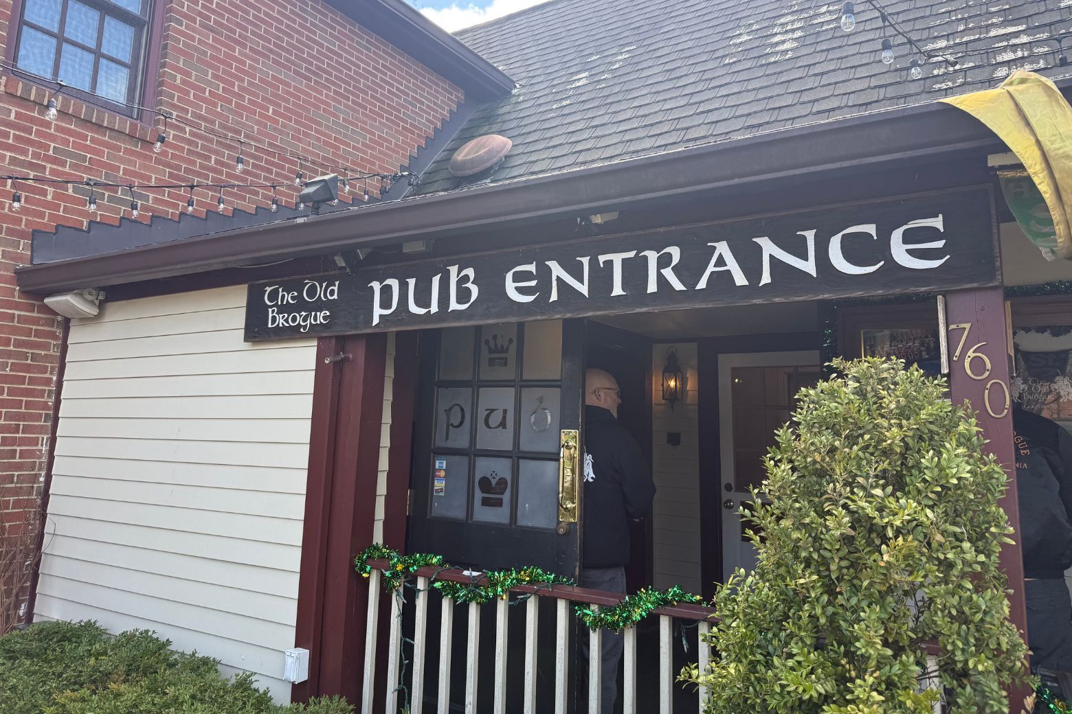 sign outside entrance for The Old Brogue Irish Pub
