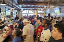 soccer fans watch game