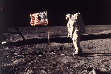 FILE - In this image provided by NASA, astronaut Buzz Aldrin poses for a photograph beside the U.S. flag deployed on the moon during the Apollo 11 mission on July 20, 1969. Television is marking the 50th anniversary of the July 20, 1969, moon landing with a variety of specials about NASA's Apollo 11 mission. (Neil A. Armstrong/NASA via AP, File)