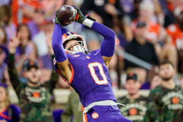 Clemson wide receiver Antonio Williams (0) makes a catch for a touchdown in the first half of an NCAA college football game against Furman, Saturday, Nov. 22, 2025, in Clemson, S.C. (AP Photo/Jacob Kupferman)