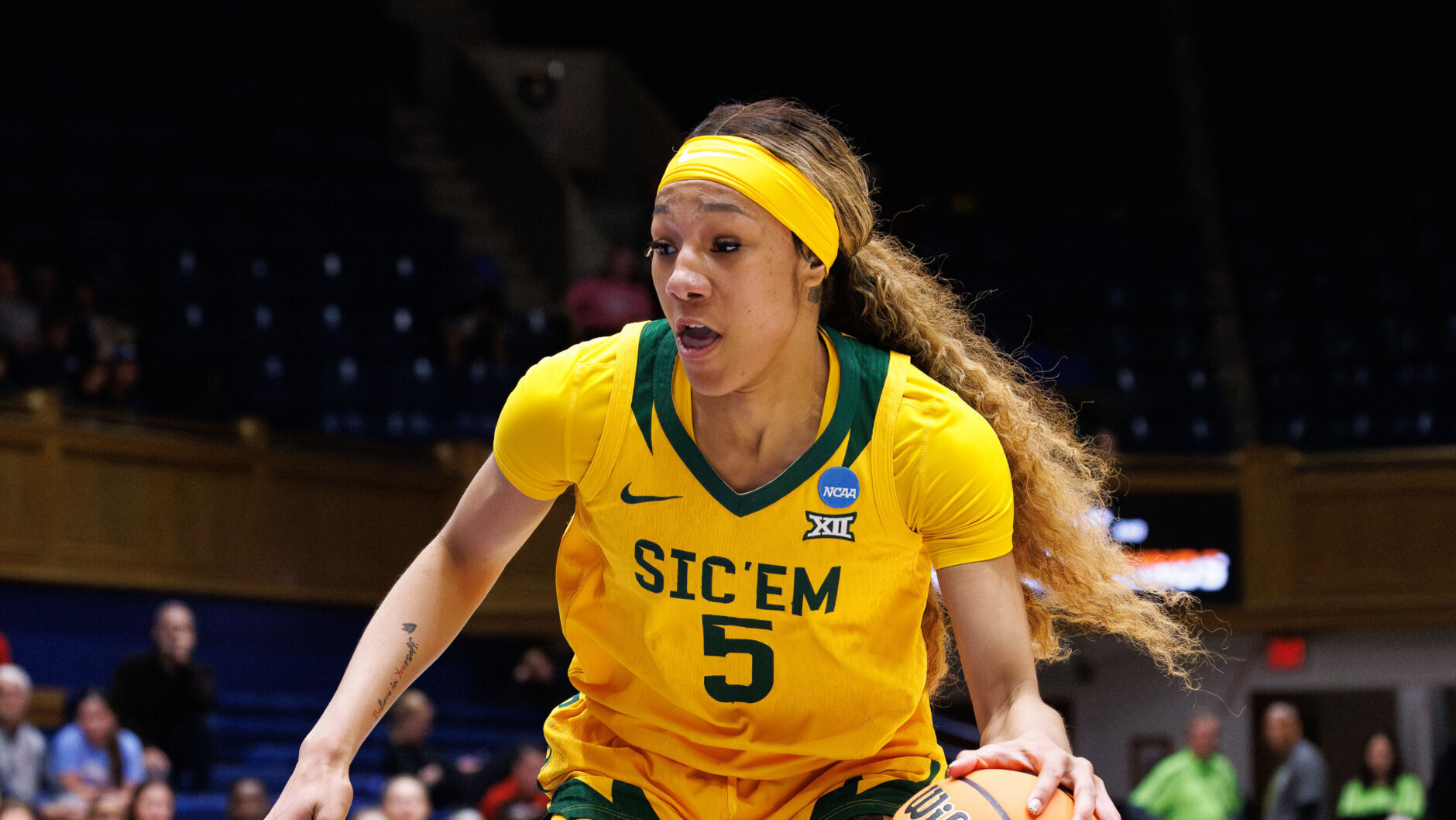 Baylor's Darianna Littlepage-Buggs (5) handles the ball in the first round of the NCAA college basketball tournament, Friday, March 20, 2026 in Durham, N.C. (AP Photo/Ben McKeown)