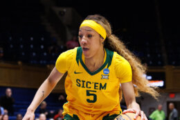 Baylor's Darianna Littlepage-Buggs (5) handles the ball in the first round of the NCAA college basketball tournament, Friday, March 20, 2026 in Durham, N.C. (AP Photo/Ben McKeown)