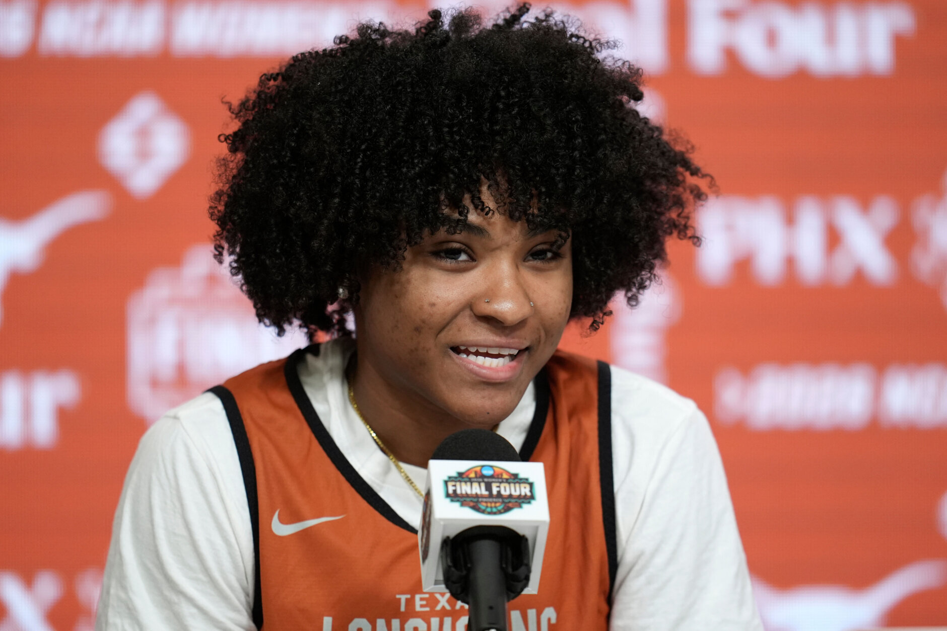 Texas guard Rori Harmon answers a question during a news conference prior to the national semifinals Women's Final Four of the NCAA college basketball tournament, Thursday, April 2, 2026, in Phoenix. (AP Photo/Ross D. Franklin)
