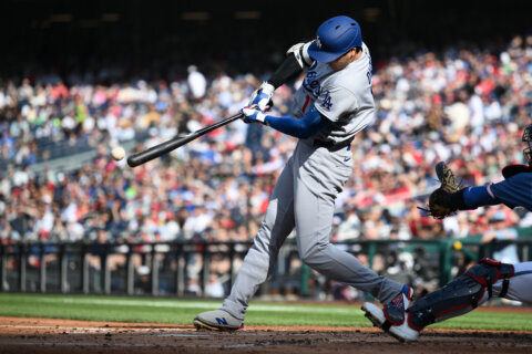 Freeman, Pages lead another offensive barrage by the Dodgers in a 10-5 win over Washington