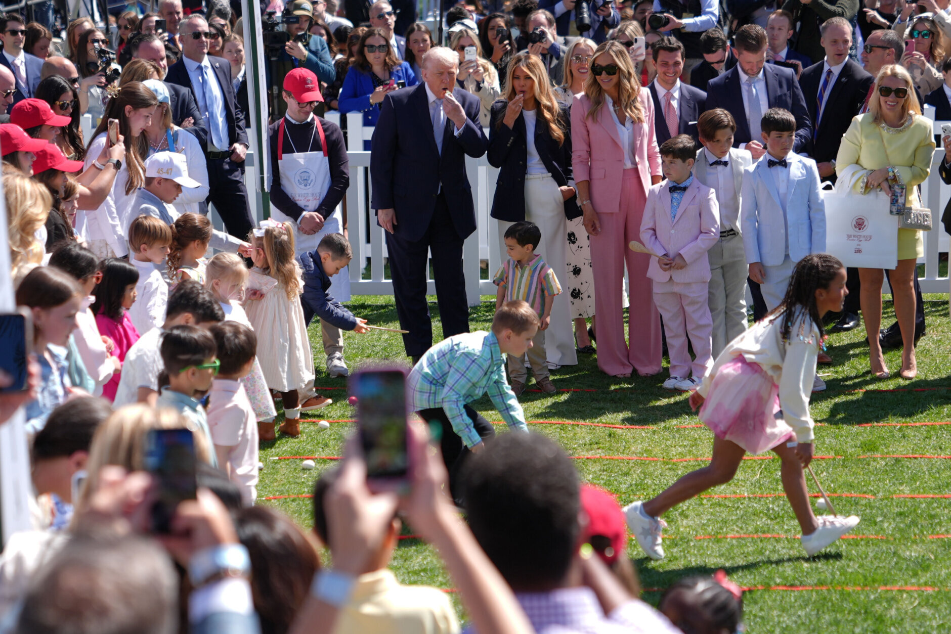 President Donald Trump and first lady Melania Trump participate in the White House Easter Egg Roll
