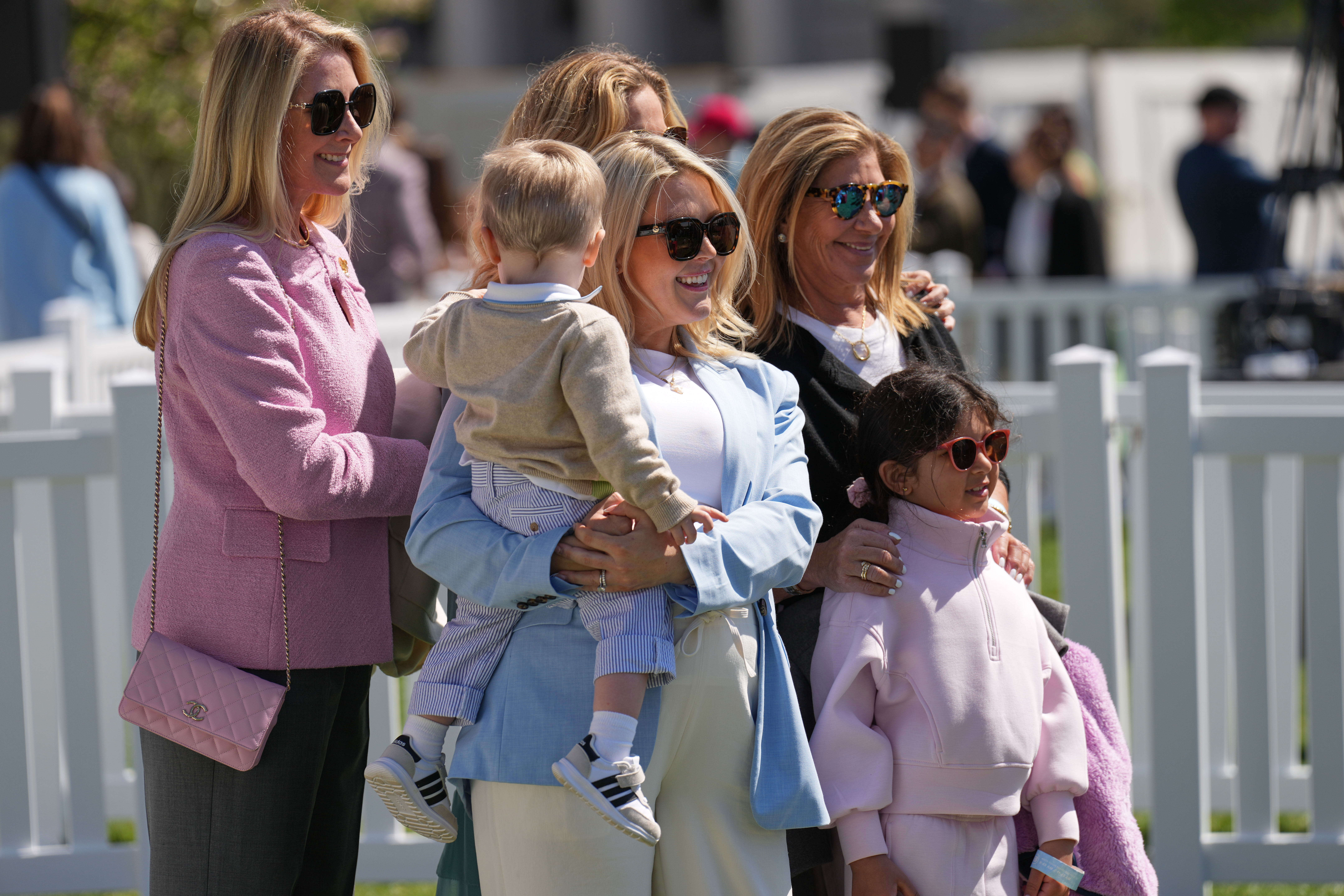 White House press secretary Karoline Leavitt, center, participates in the White House Easter Egg Roll on the South Lawn