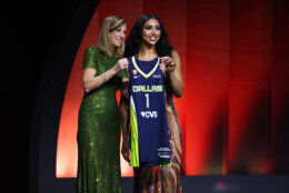 UConn guard Azzi Fudd poses with WNBA commissioner Cathy Engelbert after being selected first overall by the Dallas Wings in the first round of the WNBA basketball draft Monday, April 13, 2026, in New York. (AP Photo/Pamela Smith)