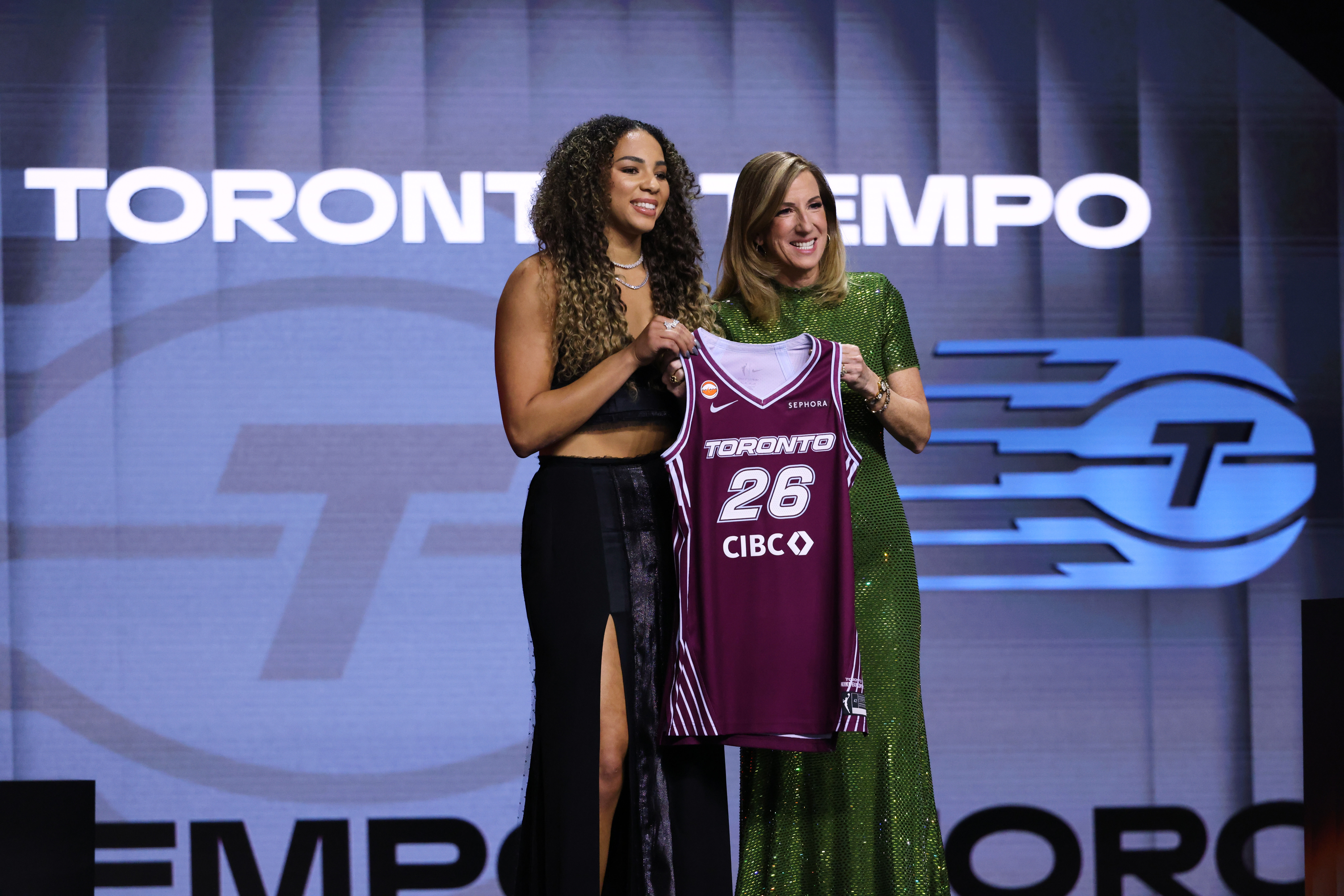 UCLA guard Kiki Rice poses with WNBA commissioner Cathy Engelbert after being selected sixth overall by the Toronto Tempo in the first round of the WNBA basketball draft Monday, April 13, 2026, in New York. (AP Photo/Pamela Smith)