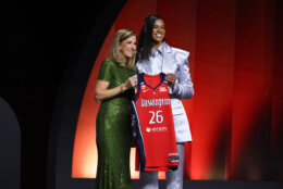 Notre Dame guard Cassandre Prosper poses with WNBA commissioner Cathy Engelbert after being selected 19th overall by the Washington Mystics in the second round of the WNBA basketball draft Monday, April 13, 2026, in New York. (AP Photo/Pamela Smith)