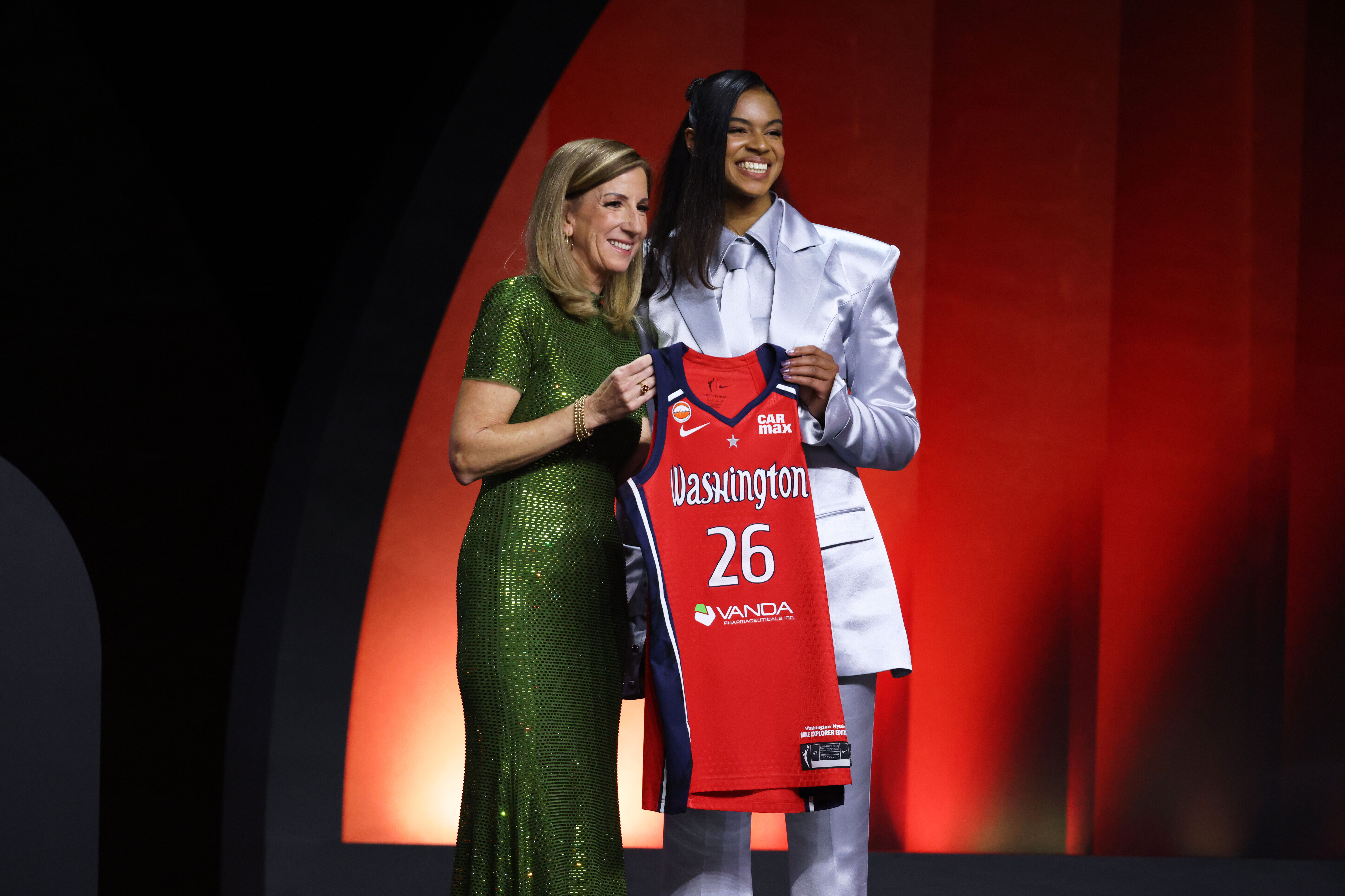 Notre Dame guard Cassandre Prosper poses with WNBA commissioner Cathy Engelbert after being selected 19th overall by the Washington Mystics in the second round of the WNBA basketball draft Monday, April 13, 2026, in New York. (AP Photo/Pamela Smith)