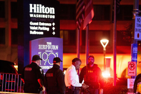 Law enforcement respond to an incident at the Washington Hilton during the White House Correspondents Dinner, Saturday, April 25, 2026, in Washington. (AP Photo/Allison Robbert)