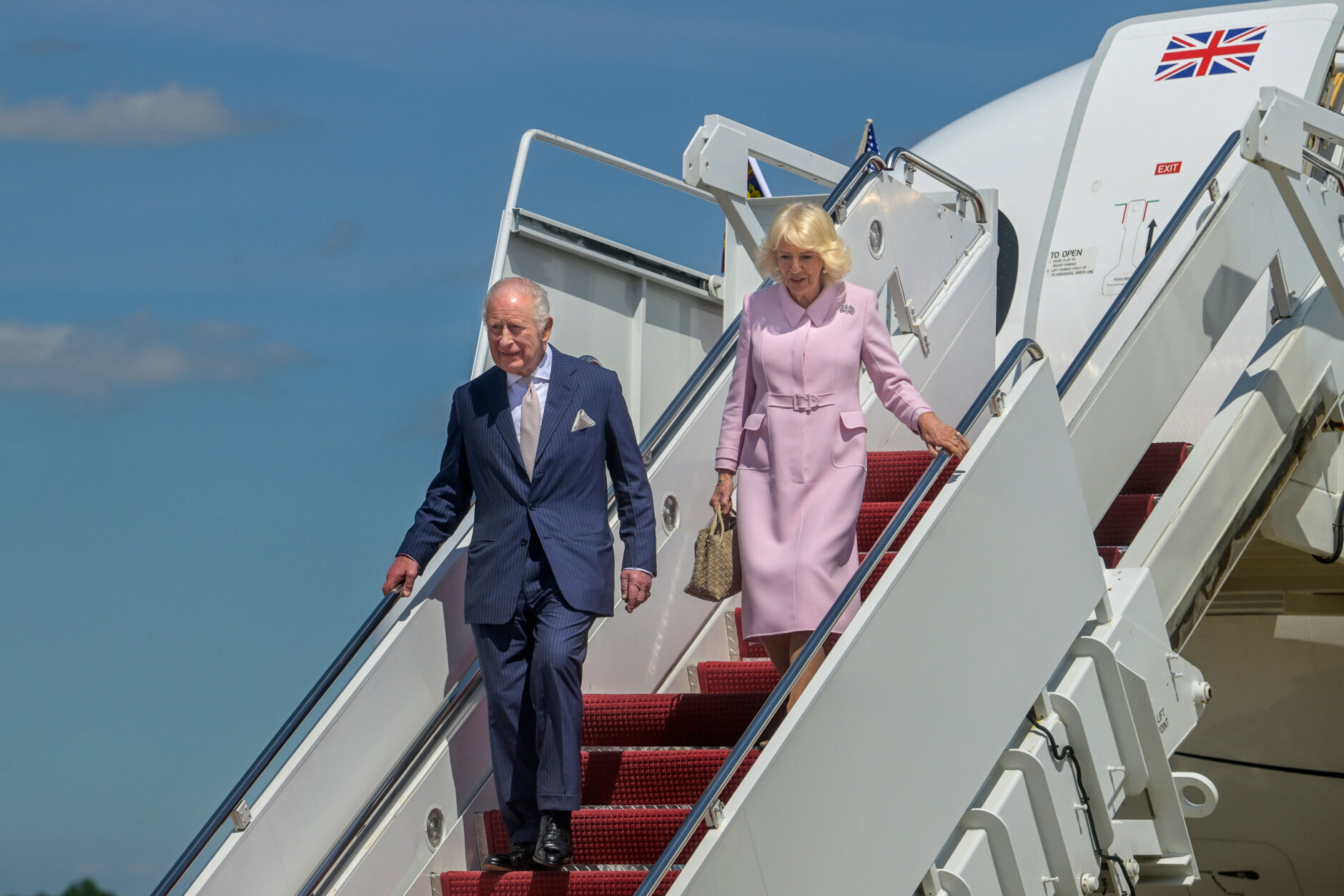 King Charles III, left, and Queen Camilla arrive at Joint Base Andrews, Maryland